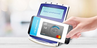 A woman using Contactless Payment