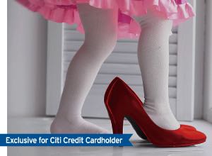 A daughter trying on her mother’s shoes