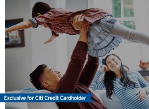 A couple playing with their daughter