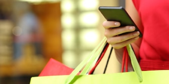 A woman shopping using Credit Card promotions A woman shopping using Credit Card promotions